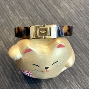 Michael Kors Bracelet . Tortoise shell. Hinged closure